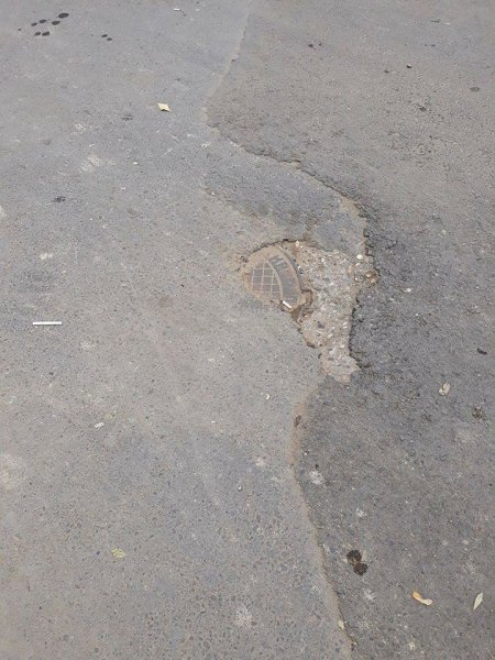 Sumqayıtda küçələrin asfaltlanması zamanı kanalizasiya quyularının üzəri örtülür - AÇIQLAMA